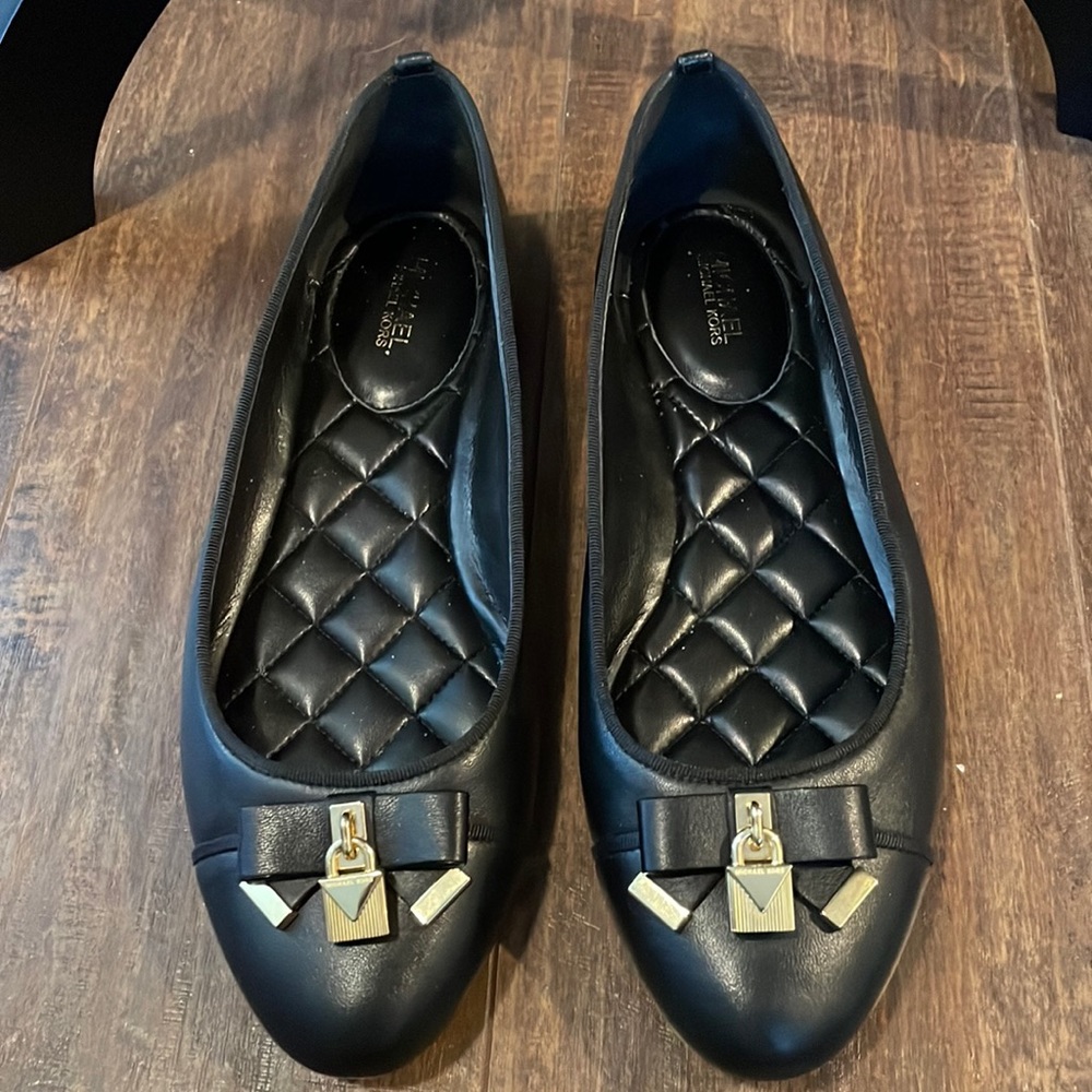 Michael Kors black leather flats.  Gold embellishments.